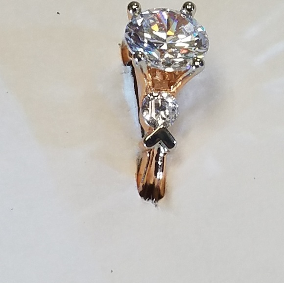 Jewelry - White sapphire mounted 18K filled.